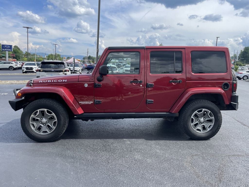 2013 Jeep Wrangler — rear three-quarter view