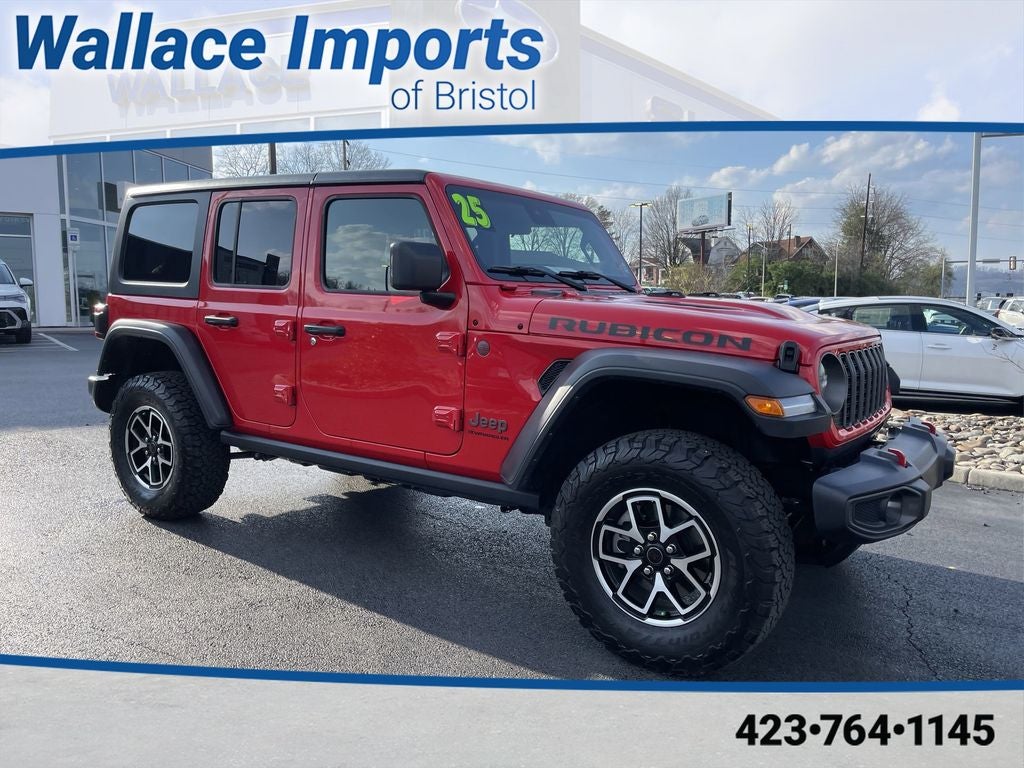 2025 Jeep Wrangler Rubicon in Firecracker Red Clearcoat — front three-quarter view