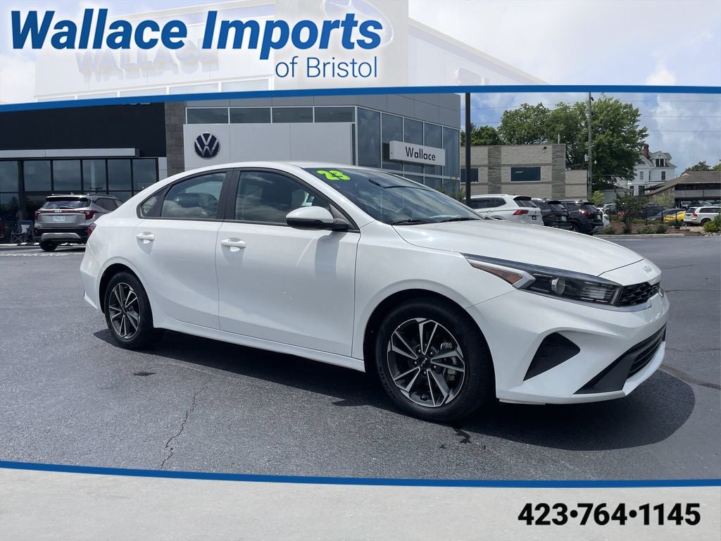 2023 Kia Forte LXS in Snow White Pearl — front three-quarter view