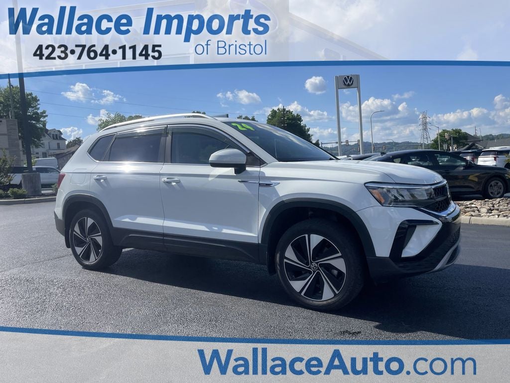2024 Volkswagen Taos 1.5T SE in Pure White — front three-quarter view