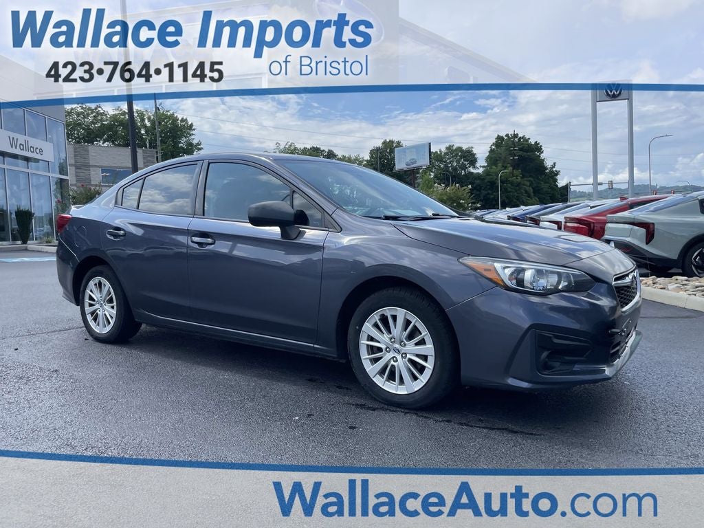 2017 Subaru Impreza 2.0i Premium in Carbide Gray Metallic — front three-quarter view