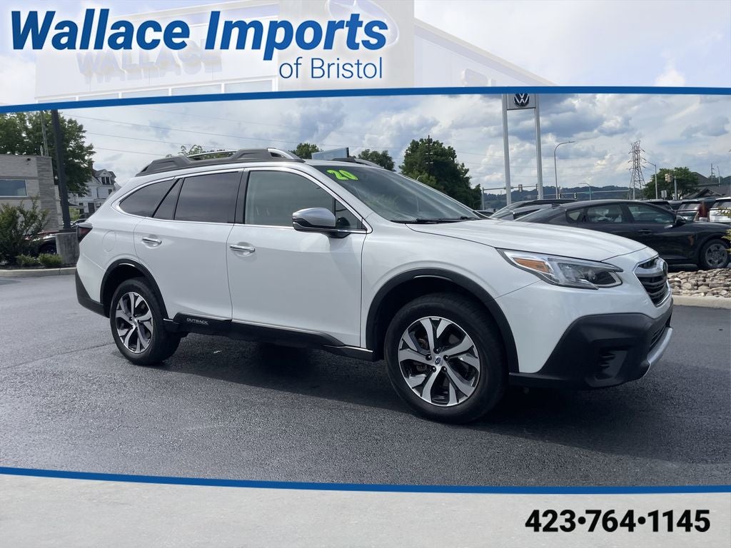 2020 Subaru Outback Touring in Crystal White Pearl — front three-quarter view