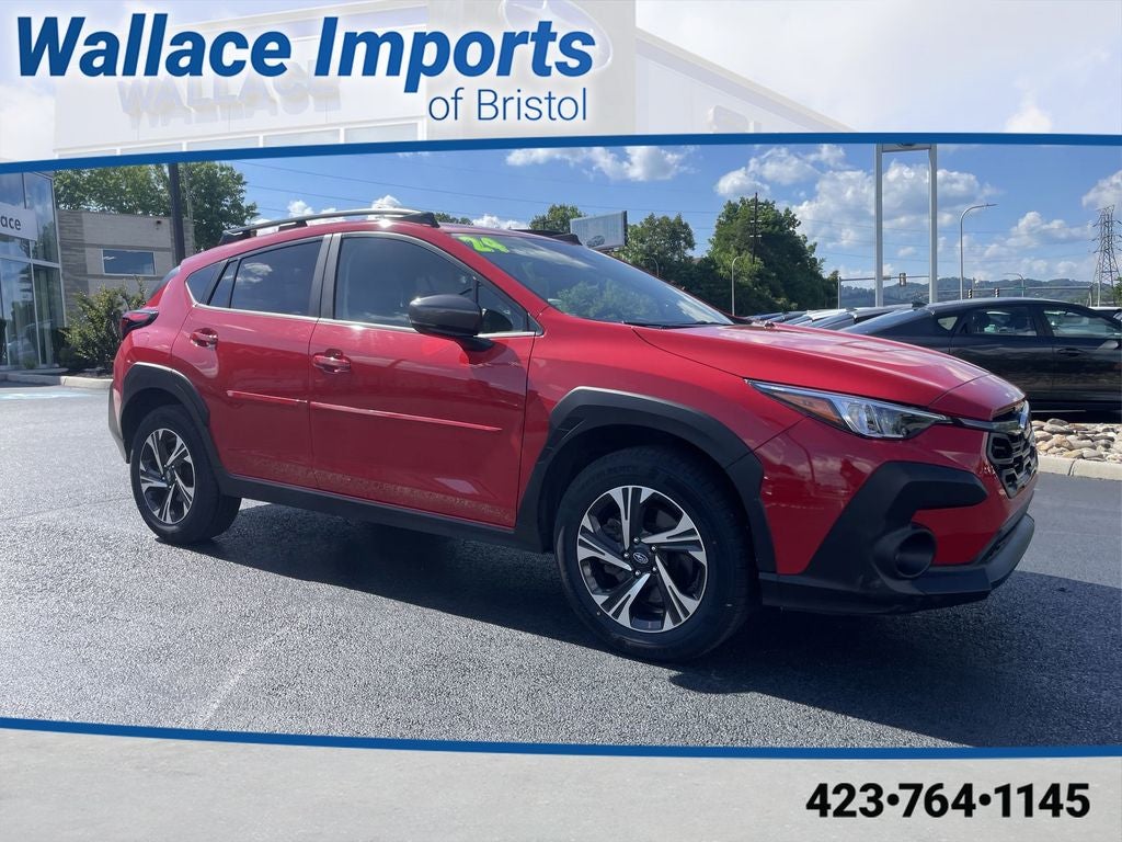 2024 Subaru Crosstrek Premium in Pure Red — front three-quarter view