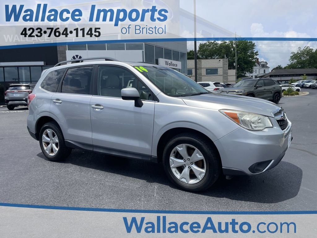 2014 Subaru Forester 2.5i Limited in Ice Silver Metallic — front three-quarter view