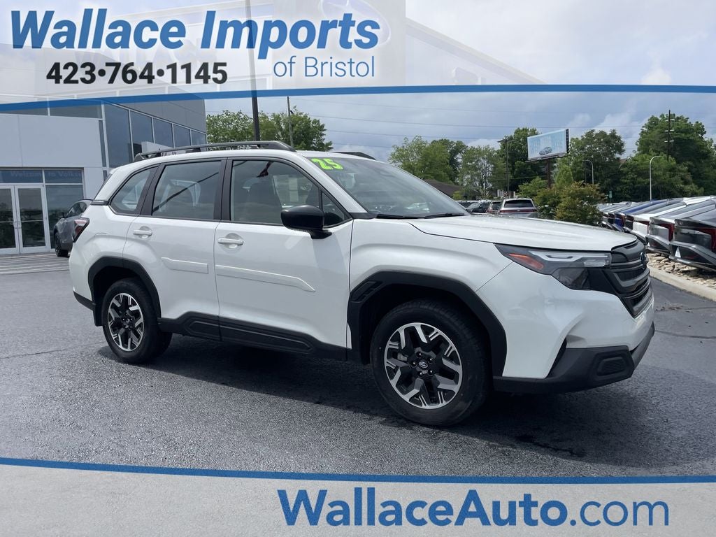 2025 Subaru Forester Base in Crystal White Pearl — front three-quarter view