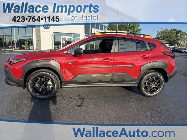 2026 Subaru CROSSTREK Wilderness in Lithium Red Pearl — front three-quarter view