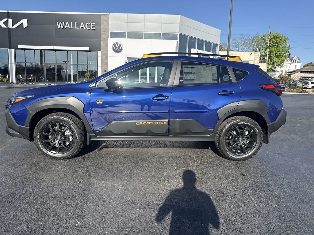 2026 Subaru CROSSTREK Wilderness in Sapphire Blue Pearl — front three-quarter view
