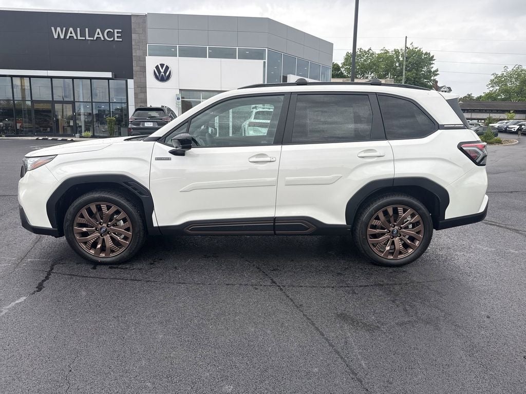 2026 Subaru FORESTER Sport Hybrid in Crystal White Pearl — front three-quarter view