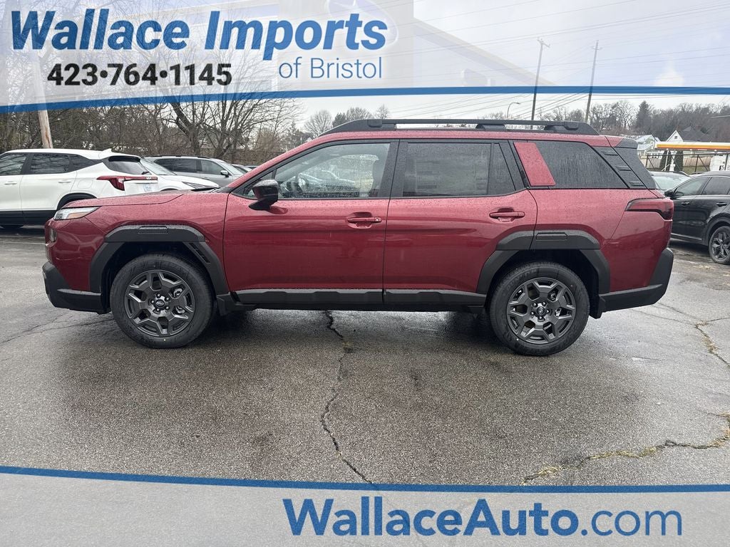 2026 Subaru OUTBACK Premium in Crimson Red Pearl — front three-quarter view