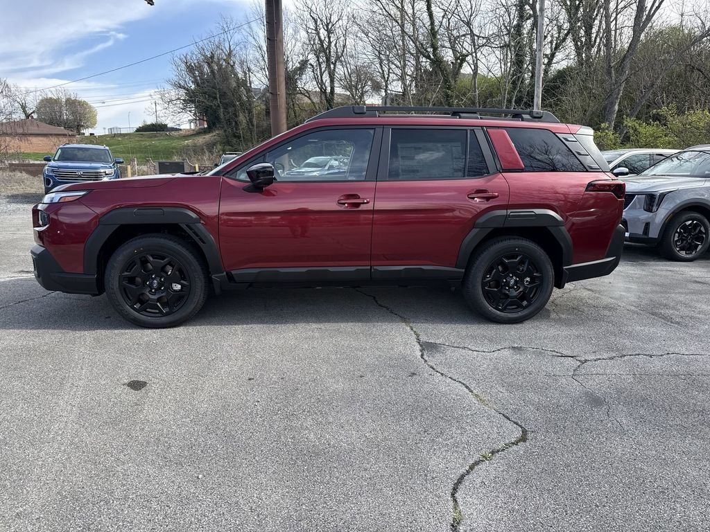 2026 Subaru OUTBACK Limited in Crimson Red Pearl — front three-quarter view