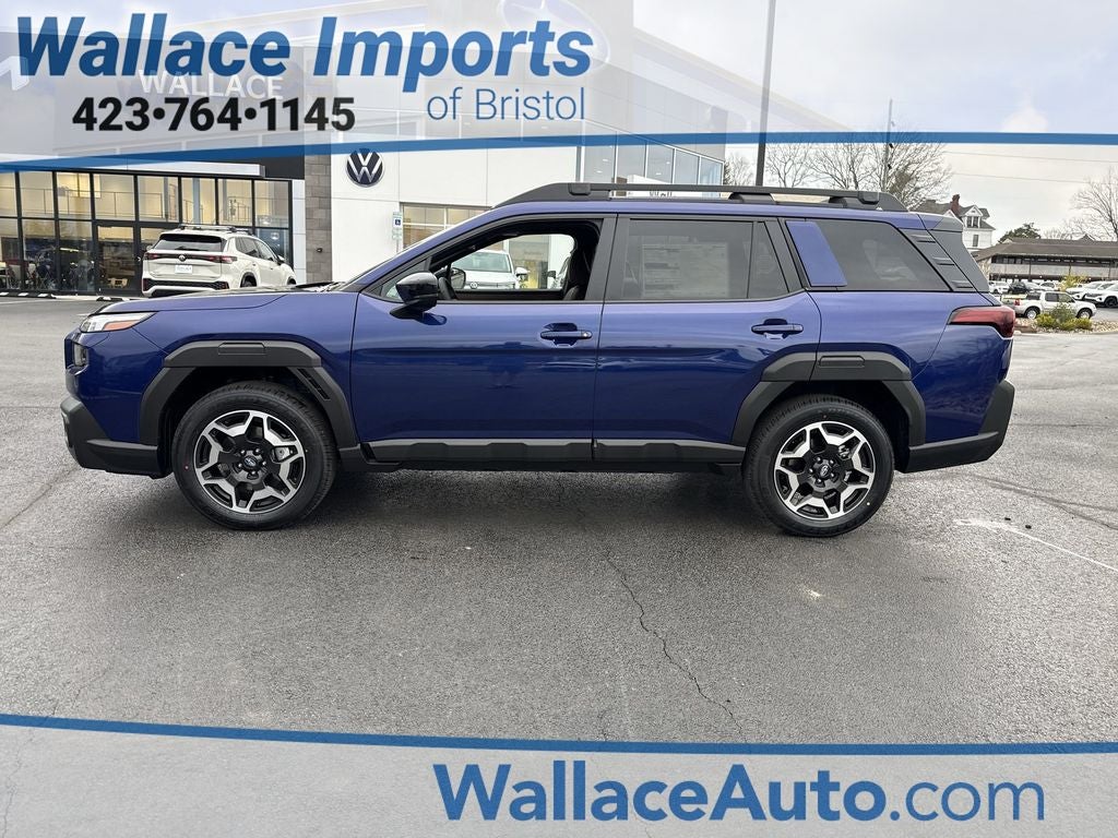 2026 Subaru OUTBACK Touring in Sapphire Blue Pearl — front three-quarter view