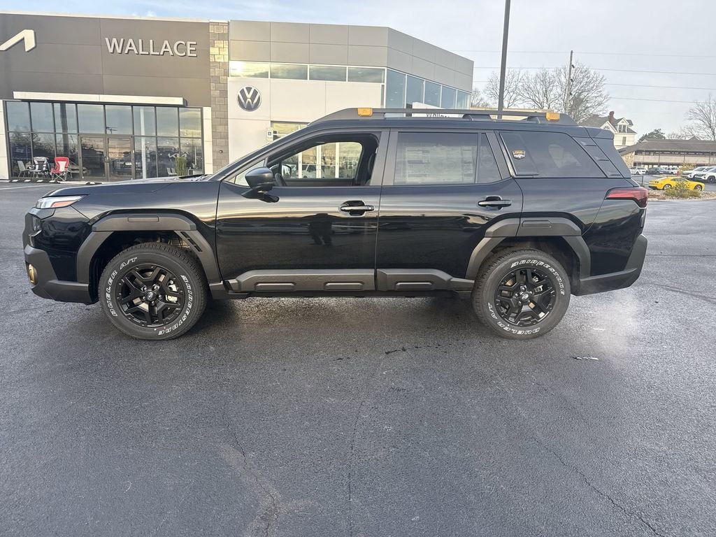 2026 Subaru OUTBACK Wilderness in Crystal Black Silica — front three-quarter view
