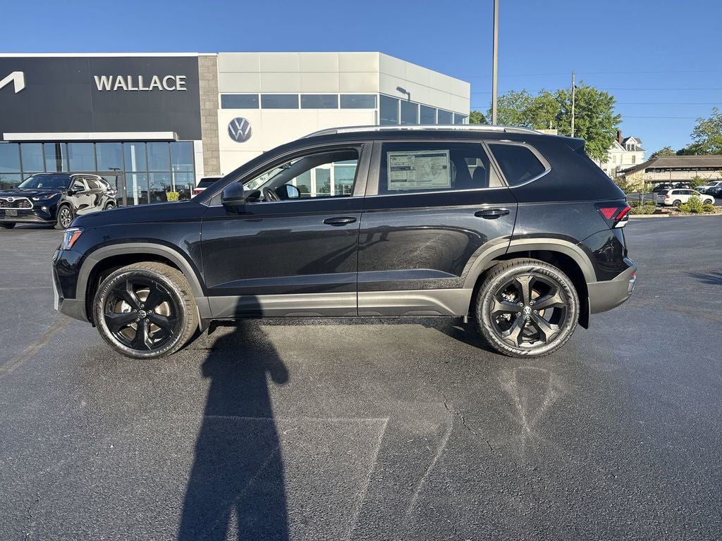 2026 Volkswagen Taos 1.5T SEL in Deep Black Pearl — front three-quarter view