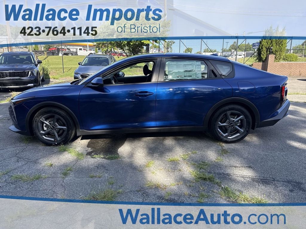 2026 Kia K4 LXS in Deep Sea Blue — front three-quarter view