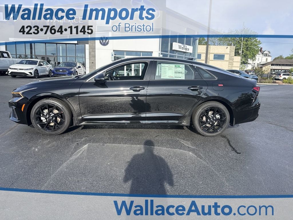 2026 Kia K5 GT-Line in Aurora Black Pearl — front three-quarter view