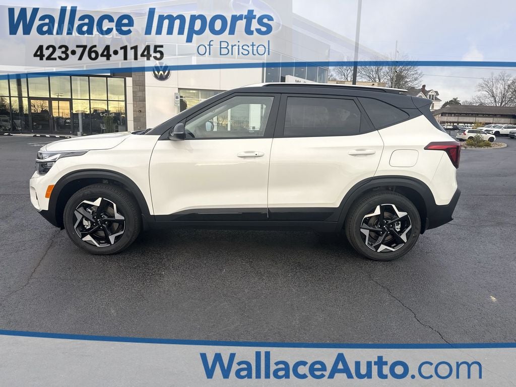 2026 Kia Seltos S in Clear White/Black Roof — front three-quarter view